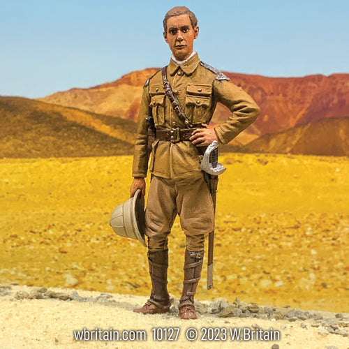 Collectible toy soldier miniature Winston Churchill, Sudan 1898. He is holding a hat and dressed on brown uniform.