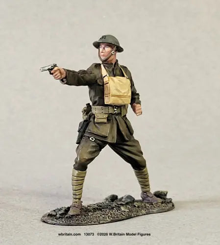 W Britain 13073 U.S. Marine NCO Belleau Wood 1918 1/30 scale matte figure in a Brodie helmet and a tan gas-mask satchel on his chest, striding forward and firing an M1911 pistol at arm's length in his right hand, with wrapped puttees and a holster at his hip, on a groundwork base.