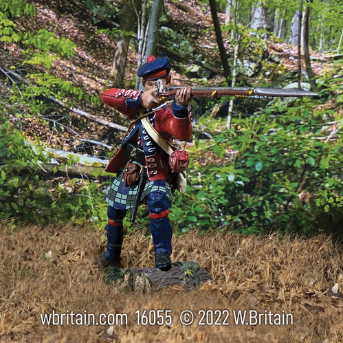 Collectible toy soldier miniature 42nd Royal Highland Regiment. Soldier is aiming musket.