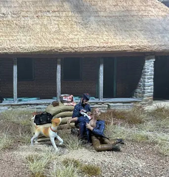 Collectible toy soldier miniature army men figurines displayed in a diorama.