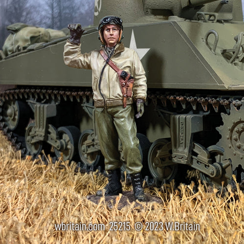 Collectible toy soldier miniature U.S. Tanker Standing Gesturing. He is standing by a tank.