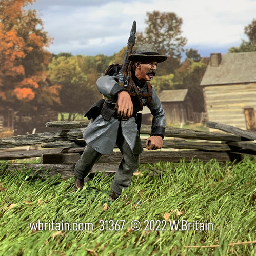 Toy soldier army men Confederate Texas Brigade Infantry Charging. On the battlefield.