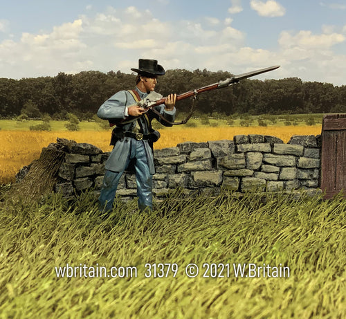 Toy soldier miniature army men Confederate in Frock Coat Advancing. Near a wall.