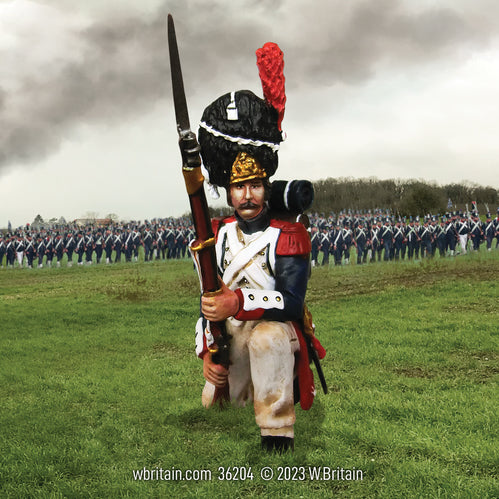 Collectible toy soldier miniature French Imperial Guard Kneeling Defending, No.2. He is on the battlefield.