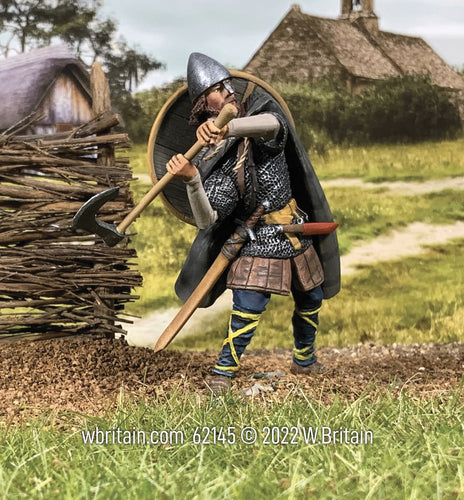 Collectible toy soldier miniature Abrecan Saxon Attacking with Axe fighting in a field.