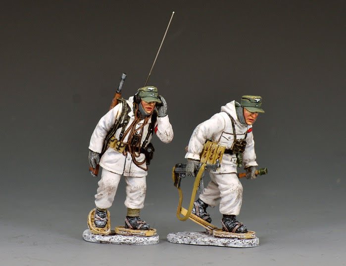 King & Country BBG136 two-figure set of a German radio team on snowshoes in white winter suits — a radio operator with a backpack set and antenna, and an MP40-armed teammate.
