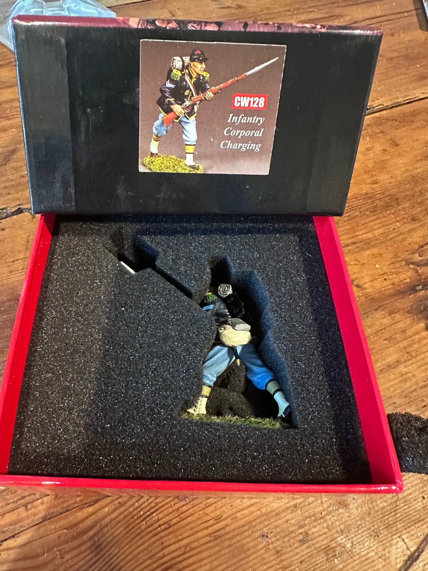 Toy soldier Infantry Corporal Charging figure in a classic red collector's box.