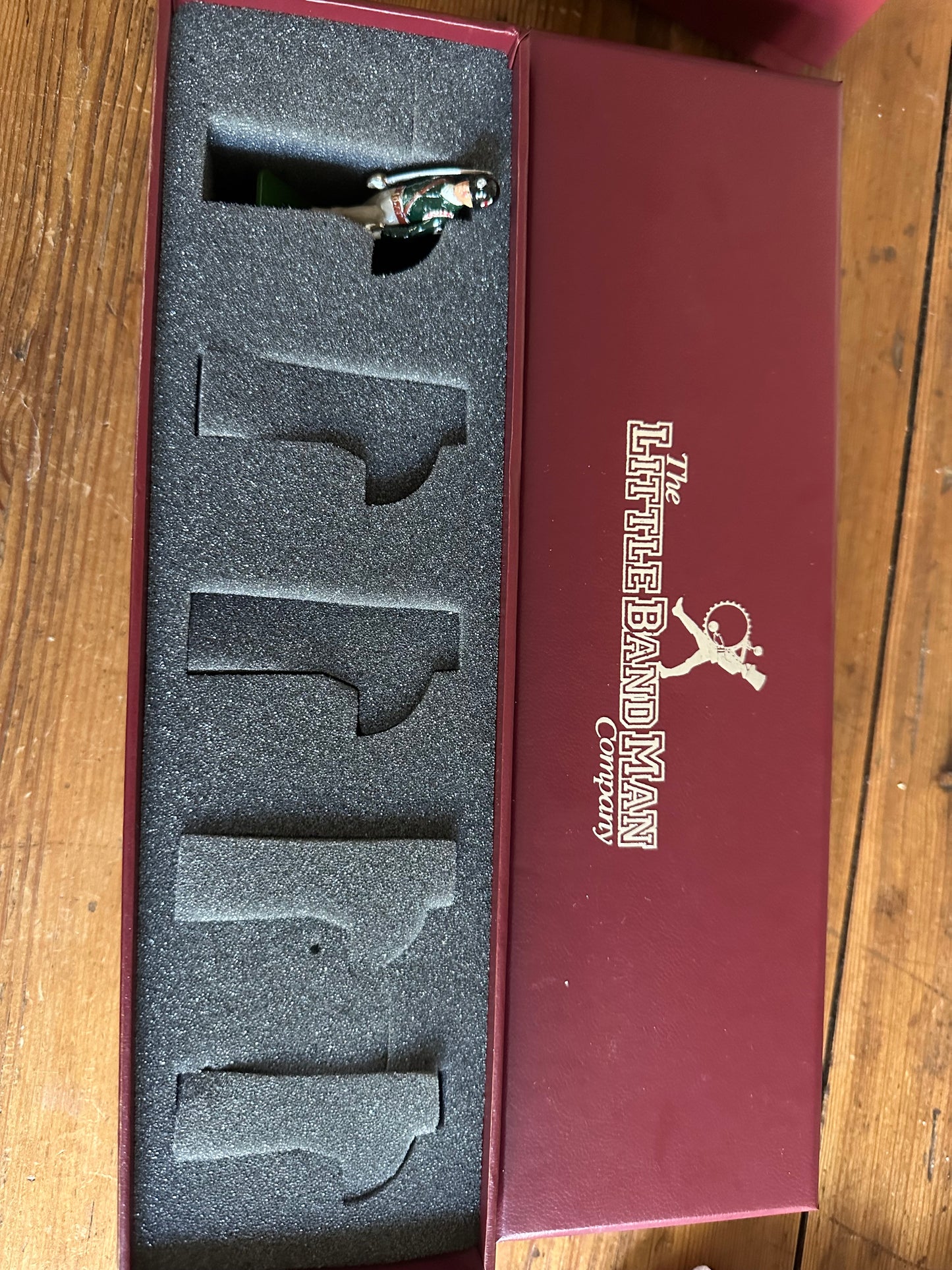 Toy soldier set Fish Drill Team packaged in maroon box.