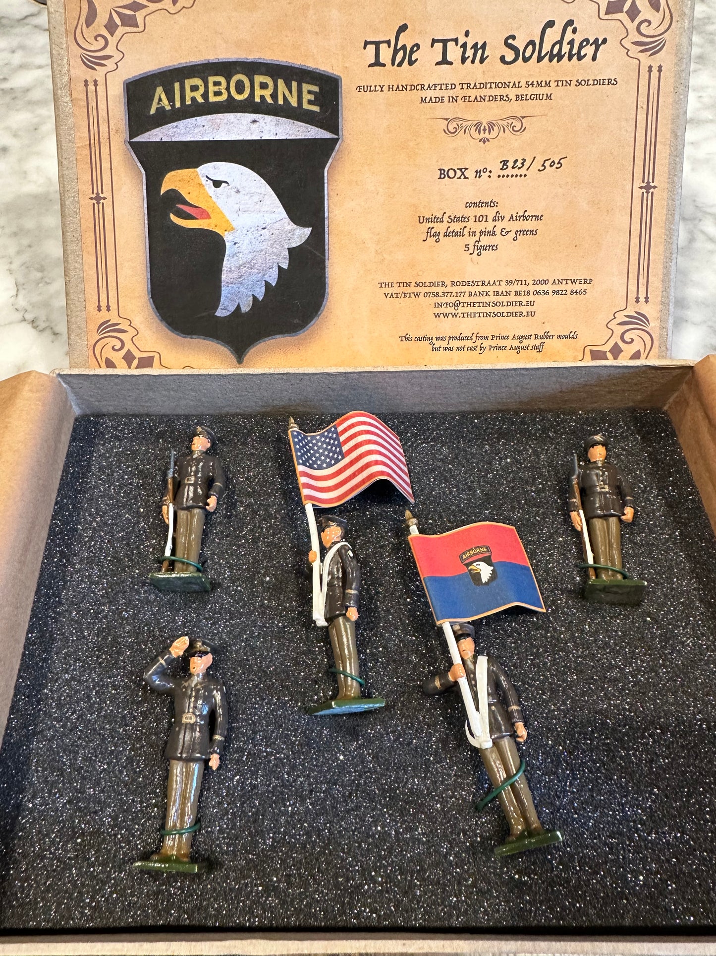 Collectible toy soldier miniature set packaged in box.