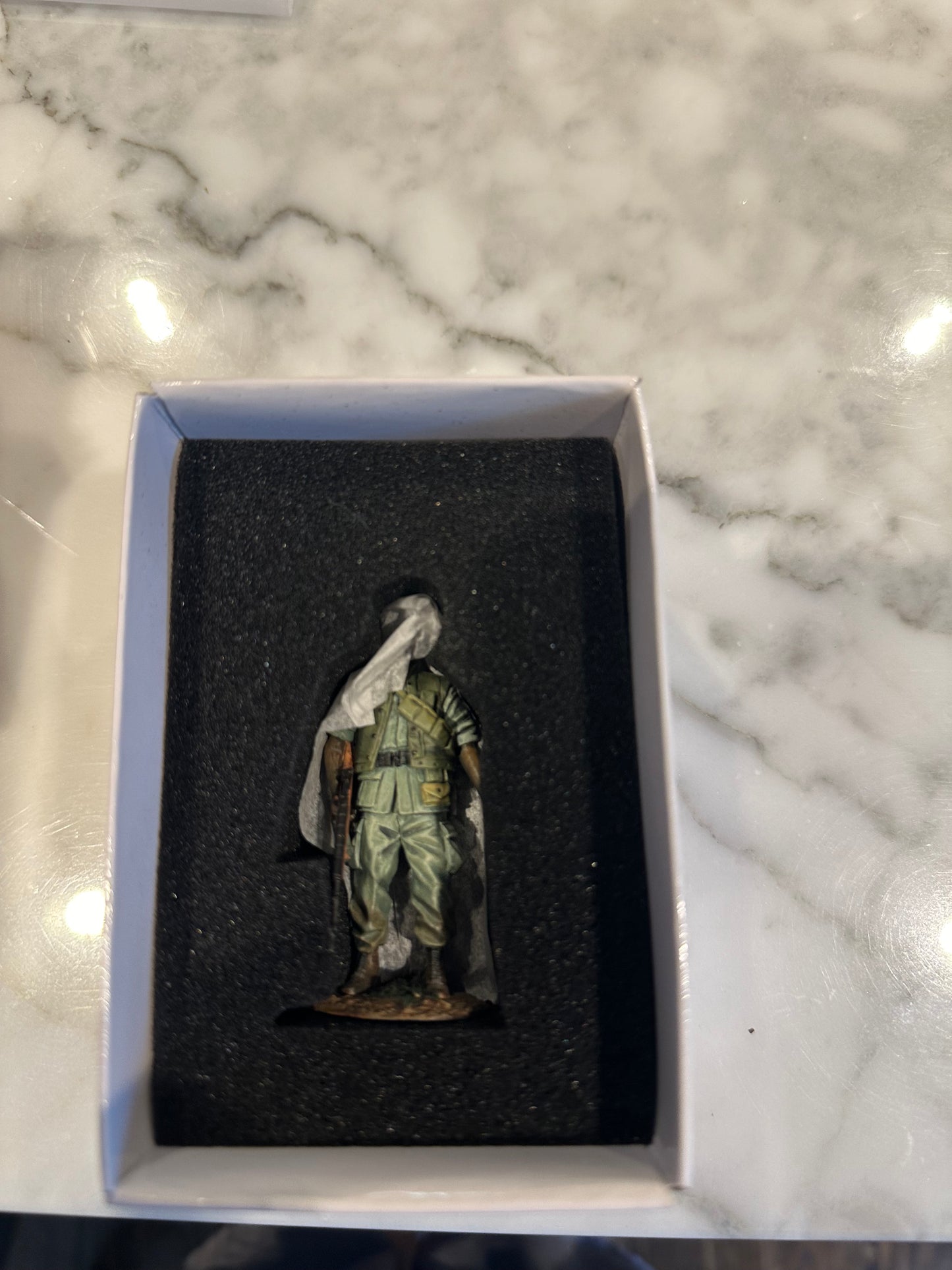 Inside the Packaging box for collectible toy soldier army men U.S. Marine, Vietnam 1967-68, No.1 figurine.