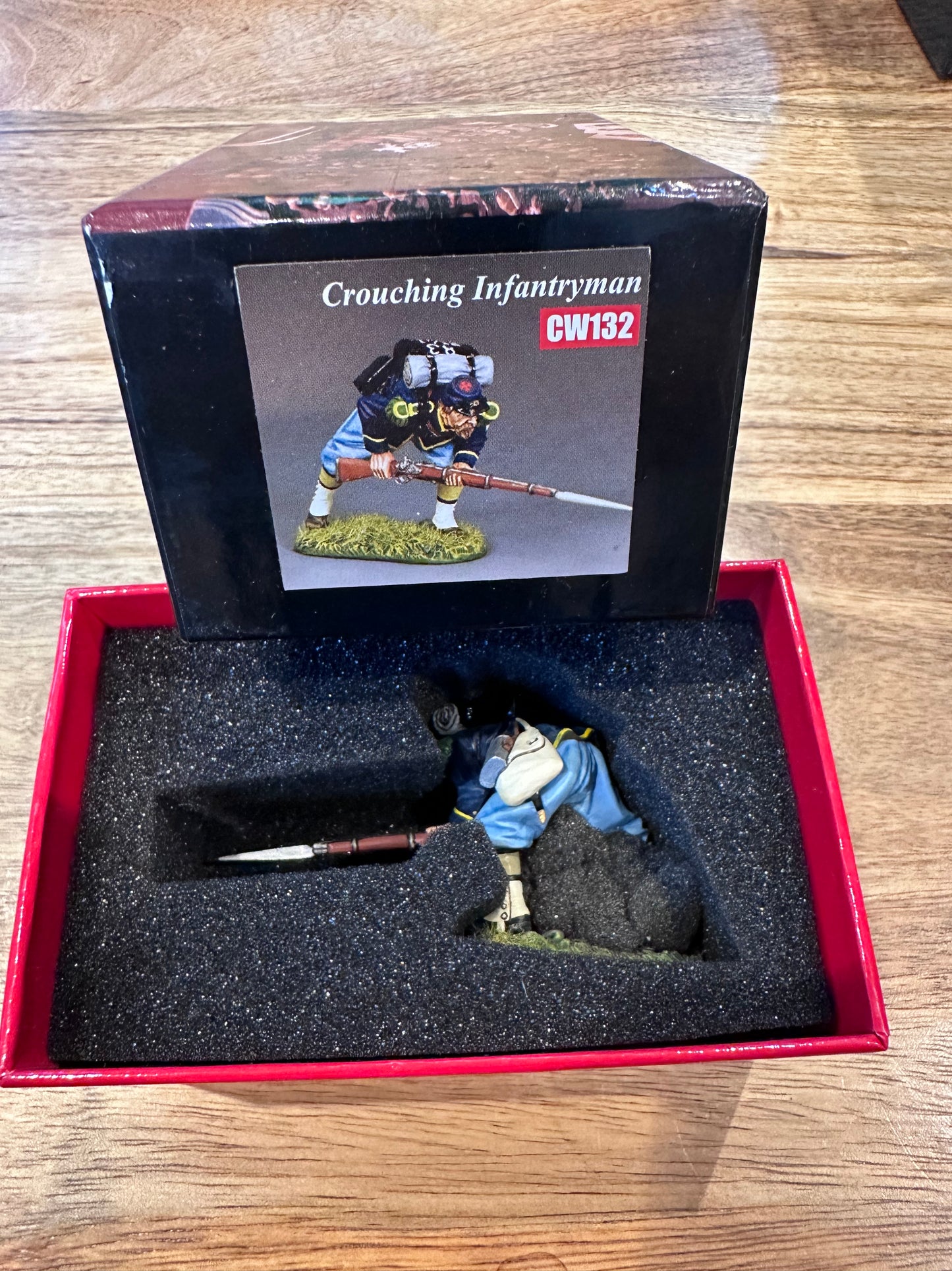 Crouching Advancing presented in a classic collector's box.