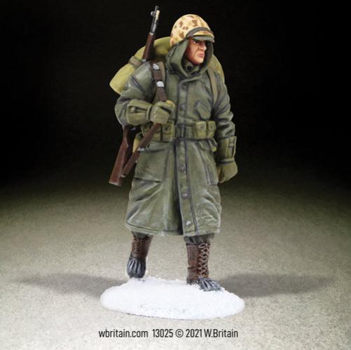 Collectible toy soldier miniature U.S. Marine Rifleman Korea. He is in winter uniform and the snow.