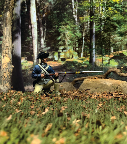 Collectible toy soldier miiature George Rodgers Clark Illinois Reg. Kneeling at the Ready in a field.