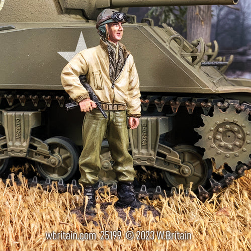 Toy soldier army men U.S. Tanker with M3 Grease Gun. Next to a tank.