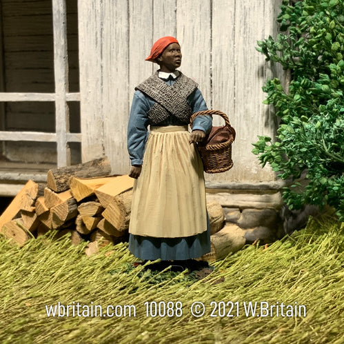 Collectible civilian miniature Harriet Tubman American Abolitionist. She is outside.