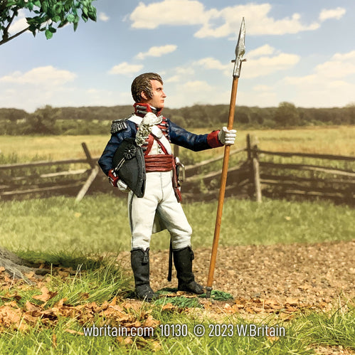 Collectible toy soldier miniature Captain Meriwether Lewis. He is in military uniform and holding a spontoon. He is on a field.