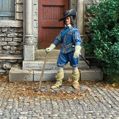Collectible toy soldier army man English King Charles I. He is standing in front of a building.