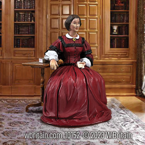 Collectible civilian miniature Clara Barton, American Civil War Nurse and Founder of the American Red Cross. Seated indoors.