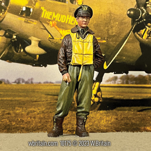 Collectible toy soldier army man U.S.A.A.F. Heavy Bomber Crewman. Standing in front of a Bomber.