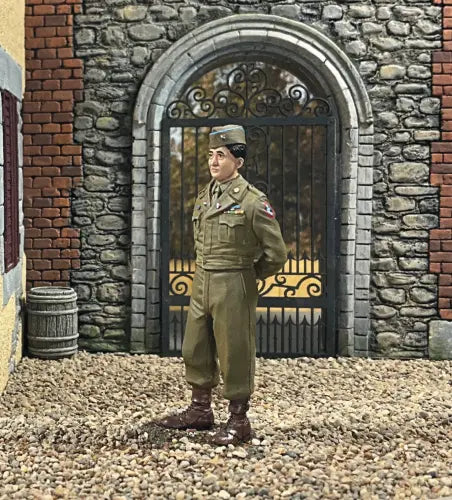 Toy Soldier miniature army men Enlisted man figurine standing in a village.