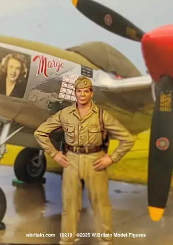 Richard Bong military miniature standing in front of plane