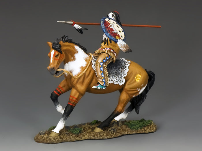 Mounted Sioux toy soldier warrior riding a painted pony, drawing back his lance to throw, with shield and tribal markings.