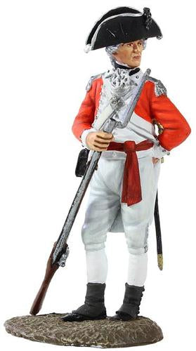 Collectible toy soldier miniature British officer in red coat holding a musket and bayonet.