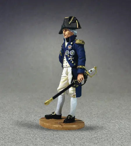 Toy soldier figurine in a blue uniform and tricorn hat, holding a sword and standing on a round wooden base.