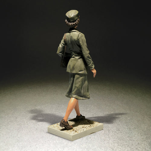 Rear view of Collectible toy soldier miniature army men U.S.M.C. Women's Reserve..