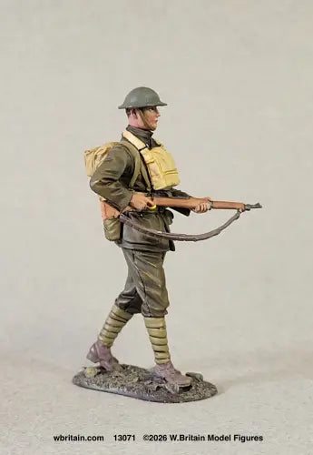 W. Britain U.S. Marine advancing with rifle at Belleau Wood, 1918 — 1/30 scale matte-painted WWI figure in Marine Corps service uniform and helmet. Catalog 13071.