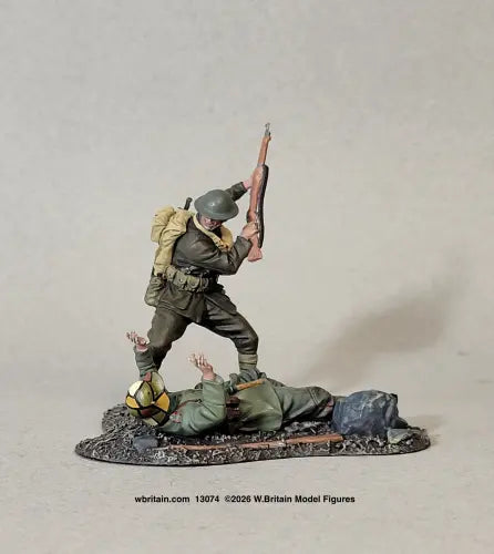 W Britain 13074 U.S. Marine Fighting with German Infantryman Belleau Wood 1918 1/30 scale matte two-figure piece — a Marine in a Brodie helmet and gas-mask satchel standing astride a fallen German in field grey, his rifle reversed and raised overhead to drive the butt down, the German on his back with one hand thrown up, on a groundwork base.