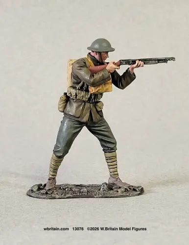 W. Britain U.S. Marine firing trench shotgun at Belleau Wood, 1918 — 1/30 scale matte-painted WWI figure in Brodie helmet and green wool service uniform. Catalog 13076.