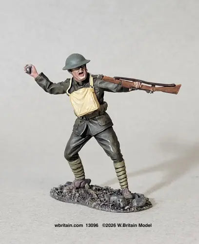 W Britain 13096 U.S. Marine Standing Throwing Grenade Belleau Wood 1918 1/30 scale matte figure in a Brodie helmet and gas-mask satchel, mouth open in a shout, right arm cocked back with a grenade and a rifle held level in his left hand, legs braced, on a groundwork base.