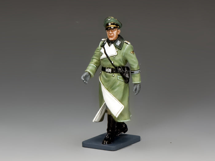 Figurine of a military officer in green uniform on a gray background
