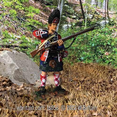 Collectible toy soldier miniature 42nd Royal Highland Regiment. Soldier is loading musket.