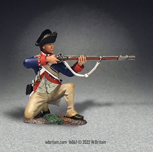 Collectible toy soldier miniature kneeling and aiming musket. Soldier is in continental uniform.