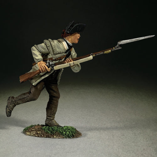 Collectible toy soldier Continental Line charging with musket and bayonet.