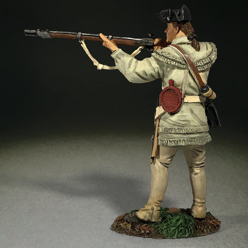 Collectible toy soldier miniature Continental line in hunting shirt standing firing.