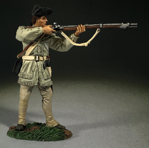 Collectible toy soldier miniature wearing green and white clothing. He is aiming a musket.