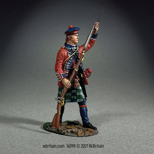 Collectible toy soldier miniature 42nd Royal Highland Regiment. He is loading musket.