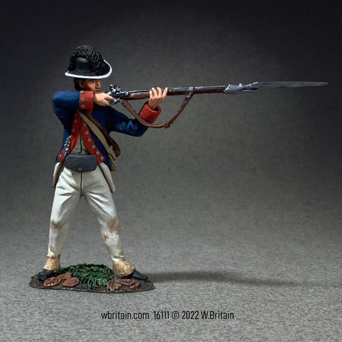 Collectible toy soldier miniature Legion of the United States. Soldier in Continental Uniform aiming a musket.