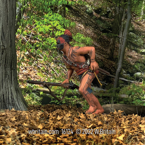 Collectible toy soldier miniature army men Native American Warrior Running Barefoot. In the forest.