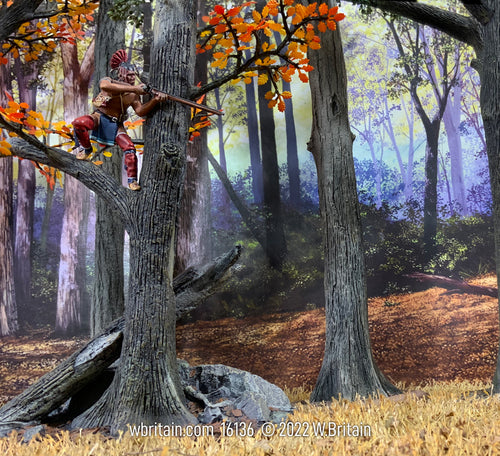 This also shows toy soldier in a tree with a forest in background