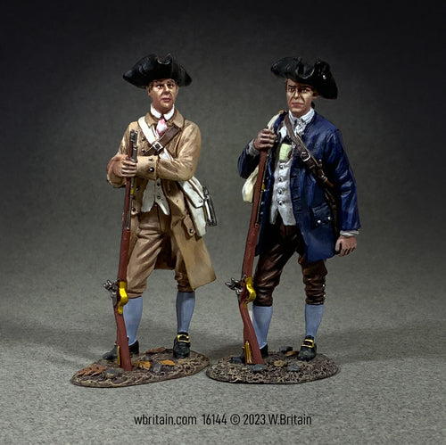 Collectible toy soldier miniatures. Two brothers in arms. Standing in colonial clothing while holding muskets.