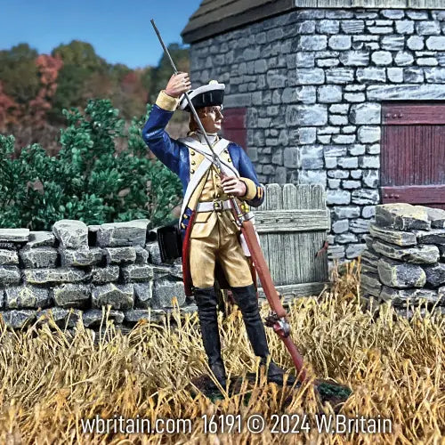 Collectible toy soldier miniature army men Hessian figurine. In a village.