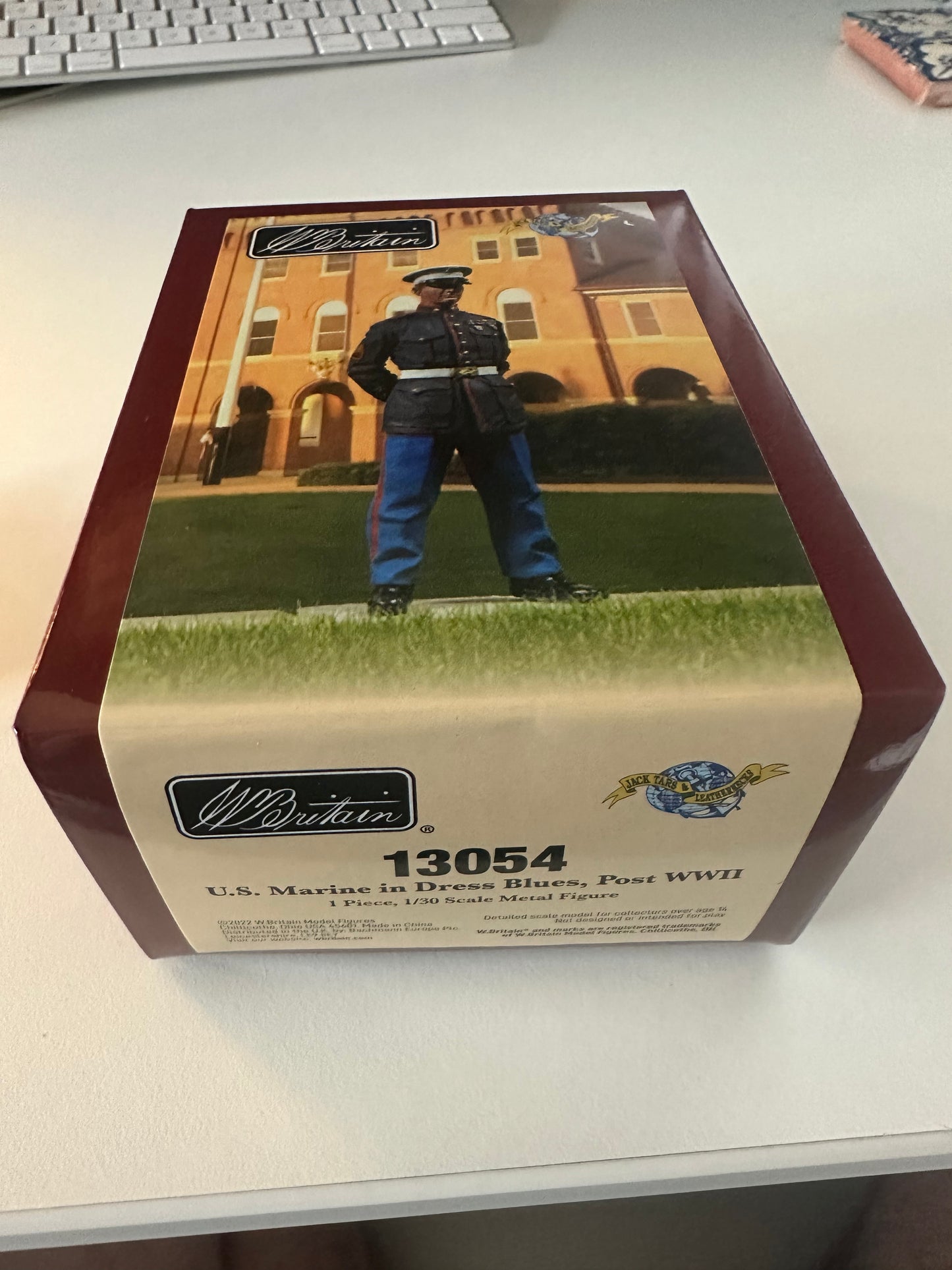 Outside of box for toy soldier figurine marine in dress blues.