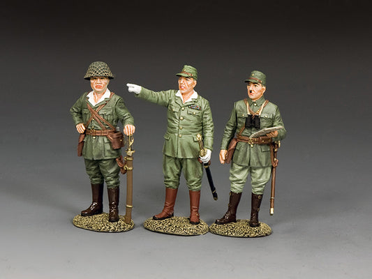 Three painted military figurines in green uniforms on a gray background