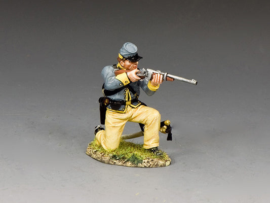 Toy Soldier Figurine Confederate cavalry trooper kneels and aims carbine, wearing gray jacket and yellow trousers in mid-battle action pose.