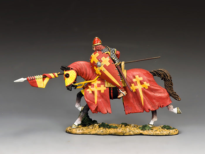 Model of a toy soldier knight on horseback with red armor and yellow crosses, holding a spear.