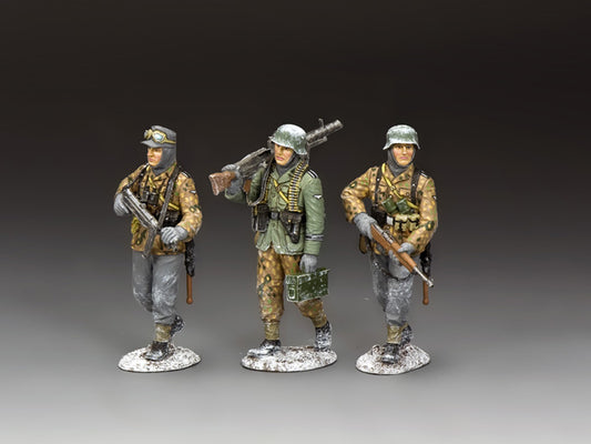 BBG125 Three toy soldiers in military uniforms with weapons on a gradient gray background